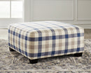Meggett Benchcraft Ottoman image